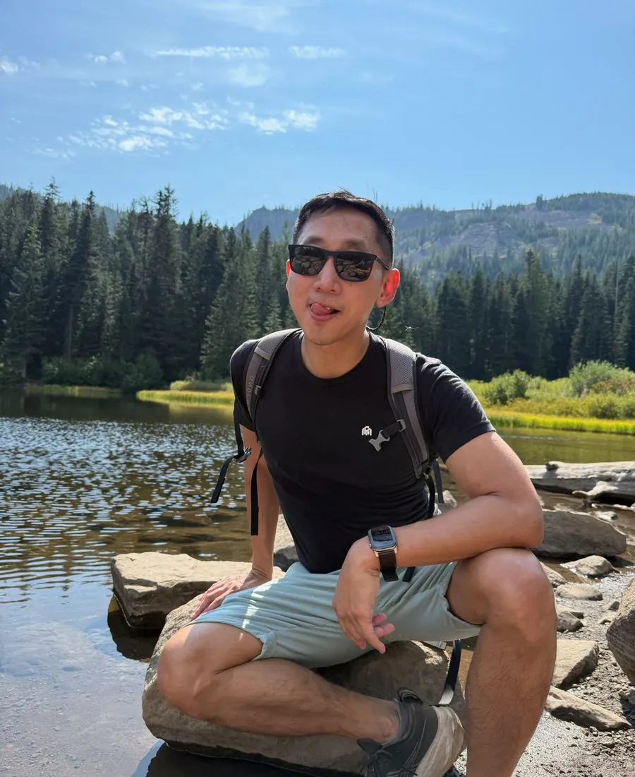 Ed hiking by an alpine lake